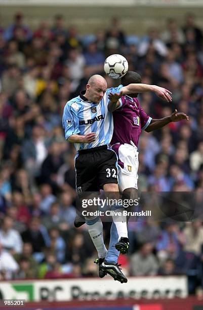 Les Carlsey of Coventry heads the ball during the FA Carling Premier League game between Aston Villa v Coventry City at Villa Park, Birmingham....