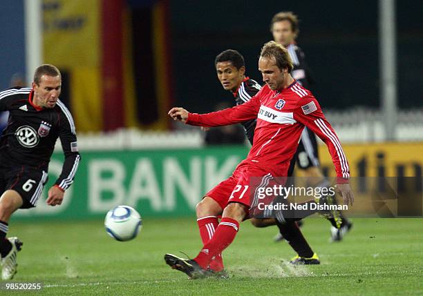 Justin Mapp of the Chicago Fire passes the ball against Andy Najar of D.C. United at RFK Stadium on April 17, 2010 in Washington, DC.