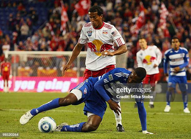 Roy Miller of the New York Red Bulls battles for the ball against Atiba Harris of the FC Dallas on April 17, 2010 at Red Bull Arena in Harrison, New...