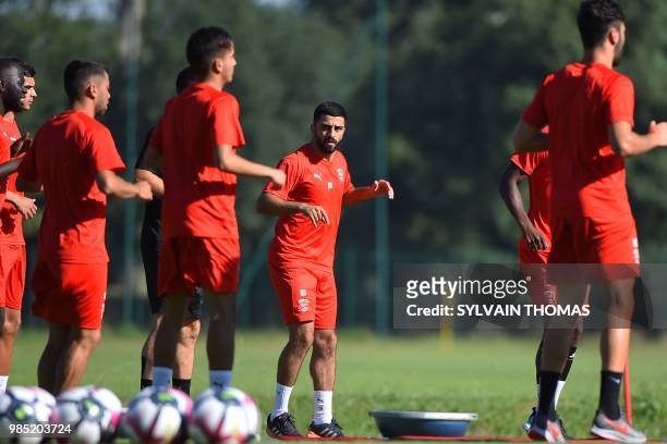 French L1 Nîmes football club's Turkish forward player Umut Bozok takes part in a training session with his teammates at the Bastide stadium in...