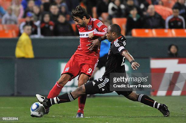 Baggio Husidic of Chicago Fire fights for control of the ball against Julius James of D.C. United at RFK Stadium on April 17, 2010 in Washington, DC....