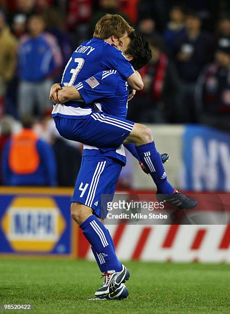 Dax McCarty of the FC Dallas celebrates his goal in the 10th minute with teammate Heath Pearce of the New York Red Bulls on April 17, 2010 at Red...