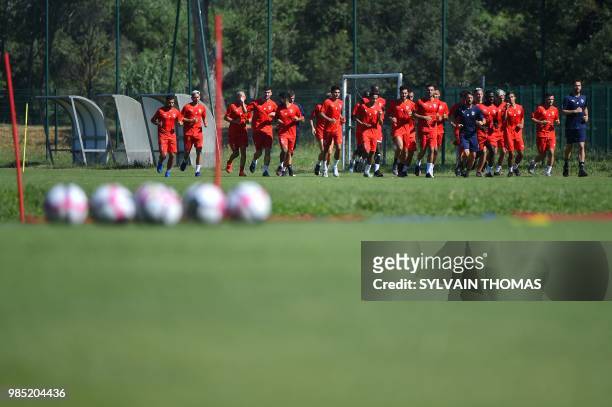 French L1 Nîmes football club's players take part in a training session, on June 27, 2018 at the Bastide stadium in Nîmes, southern France.