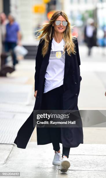 Model Heide Klum is seen wearing a Germany World Cup Jersey as she walks in Soho on June 27, 2018 in New York City.