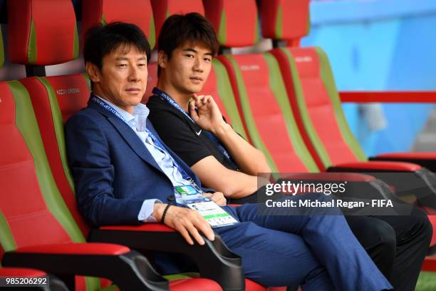 Shin Taeyoung, Manager of Korea Republic looks on from the bench during a pitch inspection prior to the 2018 FIFA World Cup Russia group F match...