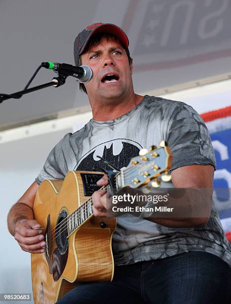 Singer Troy Gentry of the duo Montgomery Gentry performs onstage during the Academy Of Country Music's USO concert at Nellis Air Force Base on April...