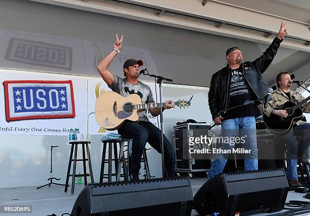 Singers Troy Gentry and Eddie Montgomery of the duo Montgomery Gentry perform onstage during the Academy Of Country Music's USO concert at Nellis Air...