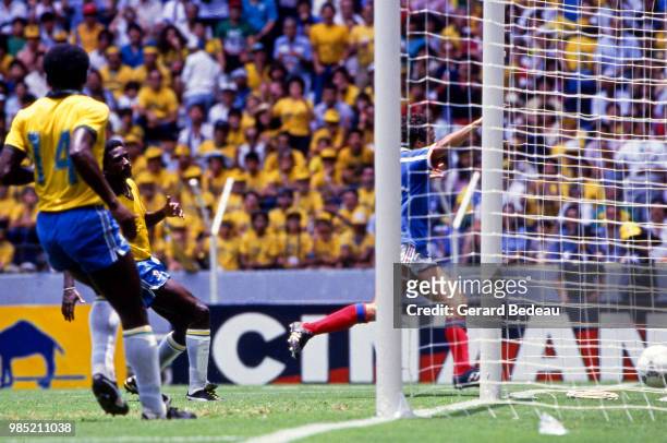 Michel Platini scores his first side's goal to make 1-1 during the FIFA World Cup quarter final match between France and Brazil played at Jalisco...