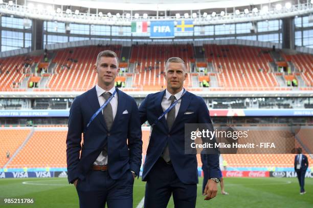 Karl-Johan Johnsson and Emil Krafth of Sweden walk on the pitch during pitch inspection prior to the 2018 FIFA World Cup Russia group F match between...