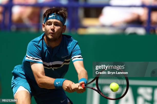 Jared Donaldson of the USA in action against Denis Shapovalov of Canada on day six of the Nature Valley International at Devonshire Park on June 27,...