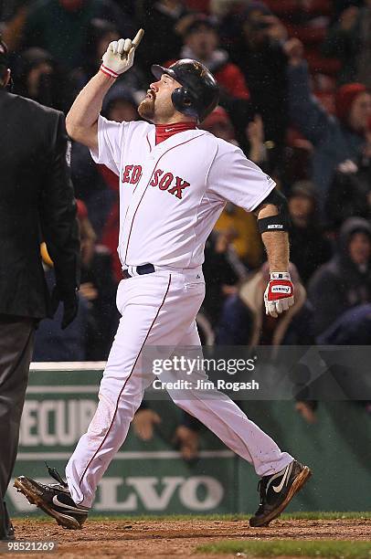 Kevin Youkilis of the Boston Red Sox hits a home run against the Tampa Bay Rays at Fenway Park on April 17, 2010 in Boston, Massachusetts.