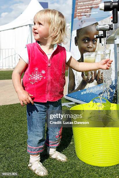 Girls plays with the water during the Dow Live Earth Run for water at The Docklands on April 18, 2010 in Melbourne, Australia.