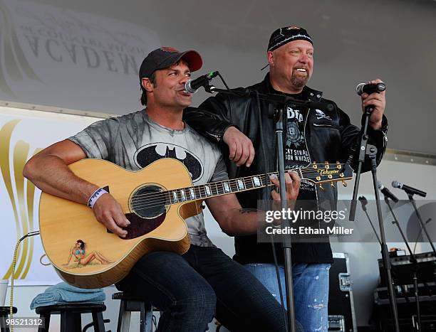 Singers Troy Gentry and Eddie Montgomery of the duo Montgomery Gentry perform onstage during the Academy Of Country Music's USO concert at Nellis Air...