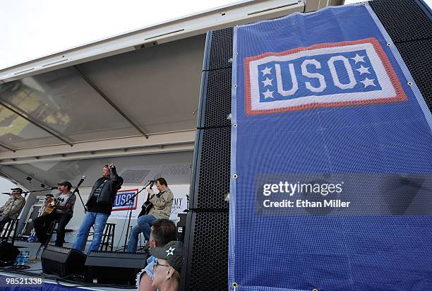 Singers Troy Gentry and Eddie Montgomery of the duo Montgomery Gentry perform onstage during the Academy Of Country Music's USO concert at Nellis Air...