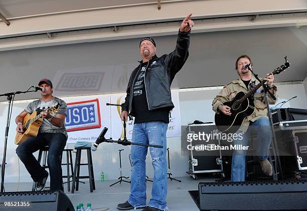 Singers Troy Gentry and Eddie Montgomery of the duo Montgomery Gentry perform onstage during the Academy Of Country Music's USO concert at Nellis Air...