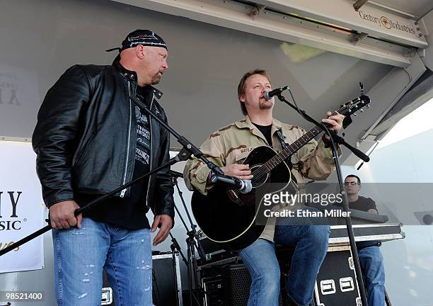Singer Eddie Montgomery of the duo Montgomery Gentry performs onstage during the Academy Of Country Music's USO concert at Nellis Air Force Base on...