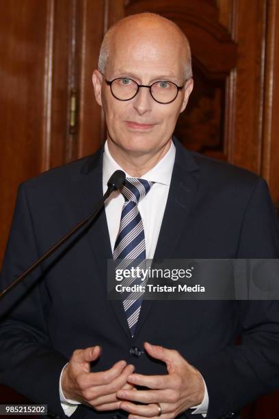 Peter Tschentscher, mayor of Hamburg during Martha Argerich signs the golden book at Hamburg City Hall on June 27, 2018 in Hamburg, Germany.