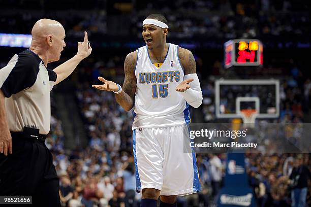 Carmelo Anthony of the Denver Nuggets argues a call and gets hit with a technical foul by referee Joey Crawford during the first half of Game One of...