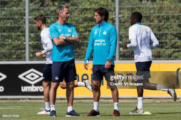 Assistent trainer Andre Ooijer of PSV, head of the youth department Ernest Faber of PSV during a trainings session of PSV Eindhoven at the Herdgang...