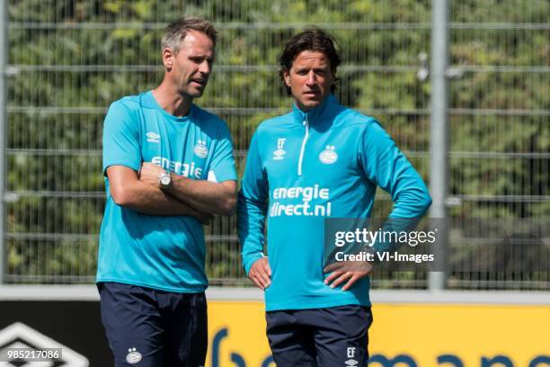Assistent trainer Andre Ooijer of PSV, head of the youth department Ernest Faber of PSV during a trainings session of PSV Eindhoven at the Herdgang...
