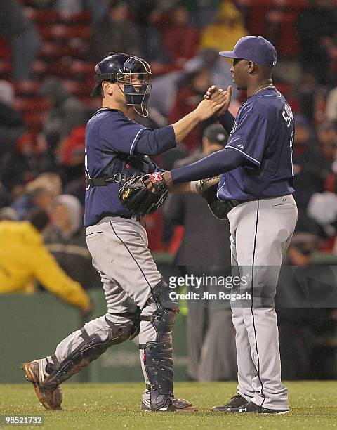 John Jaso and Rafael Soriano of the Tampa Bay Rays celebrate after they defeated the Boston Red Sox, 6-5, at Fenway Park on April 17, 2010 in Boston,...