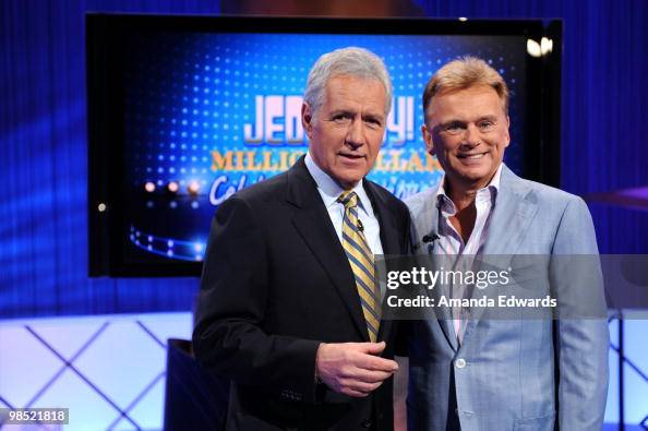 Game show hosts Alex Trebek and Pat Sajak pose on the set of the ...