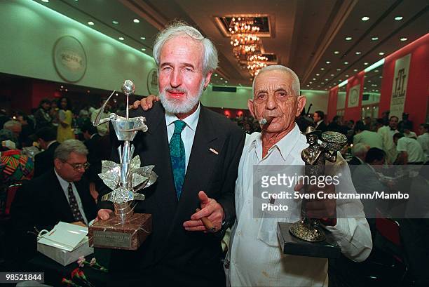 Cuba's most famous tobacco grower, Alejandro Robaina poses for a photo with Villiger , German exclusive importer of Cuban cigars, during the annual...