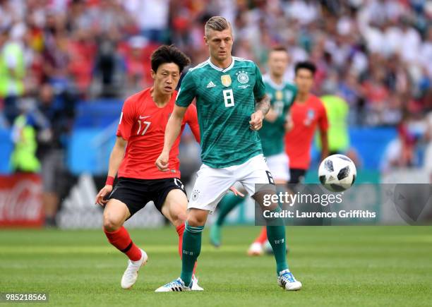 Lee Jae-Sung of Korea Republic challenges Marco Fabian of Mexico during the 2018 FIFA World Cup Russia group F match between Korea Republic and...