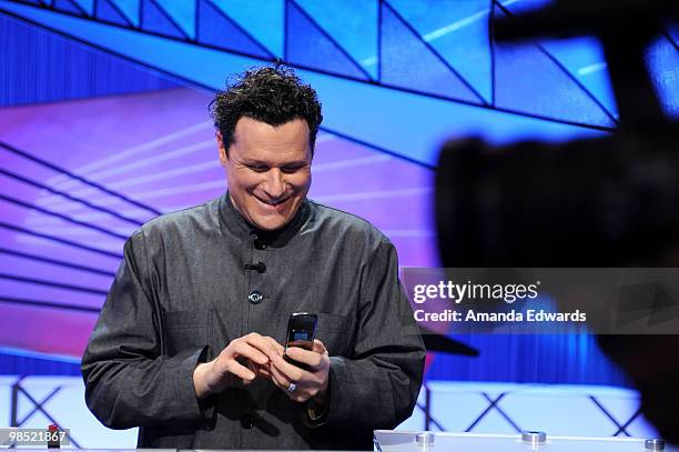 Fashion designer Isaac Mizrahi poses on the set of the "Jeopardy!" Million Dollar Celebrity Invitational Tournament Show Taping on April 17, 2010 in...