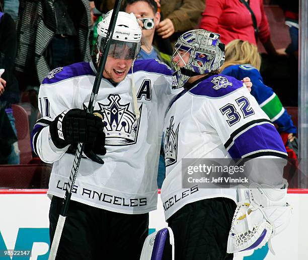 Anze Kopitar of the Los Angeles Kings is congratulated by teammate Jonathan Quick after scoring the overtime winning gal in Game Two of the Western...