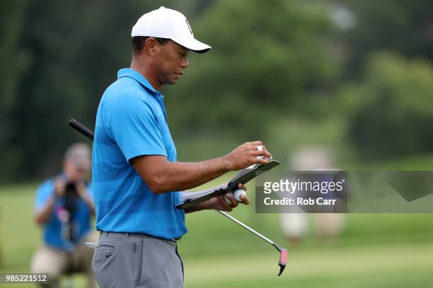 Tiger Woods waits to putt while playing in the Pro-Am prior to the Quicken Loans National at TPC Potomac on June 27, 2018 in Potomac, Maryland.