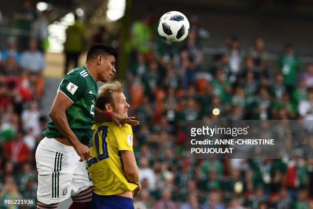 Mexico's defender Jesus Gallardo and Sweden's forward Ola Toivonen vie for the ball during the Russia 2018 World Cup Group F football match between...