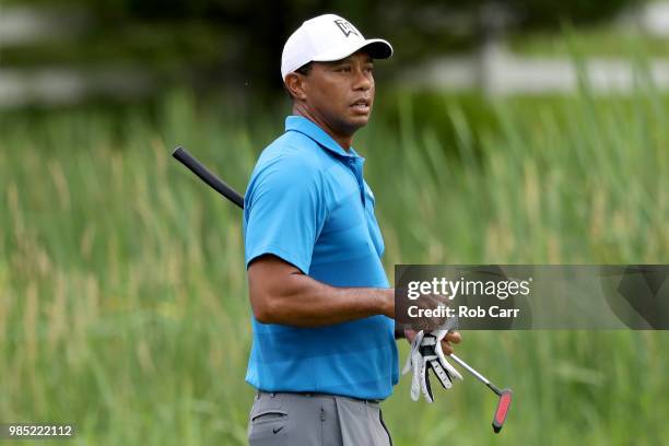 Tiger Woods walks to the sixth tee while playing in the Pro-Am prior to the Quicken Loans National at TPC Potomac on June 27, 2018 in Potomac,...