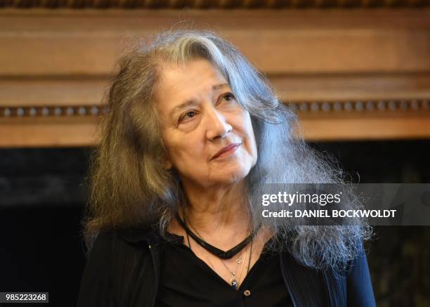 Argentine pianist Martha Argerich is pictured after she signed the city's golden book at the City Hall in Hamburg on June 27, 2018. / Germany OUT