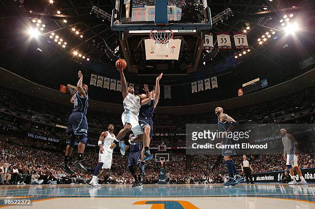 Chauncey Billups of the Denver Nuggets goes to the basket against Mehmet Okur of the Utah Jazz in Game One of the Western Conference Quarterfinals...
