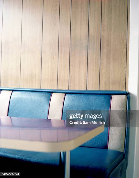 Retro blue and white leather bench seat a Stadium Diner just off the A1 on the 21st April 2010 in Colsterworth in the United Kingdom.