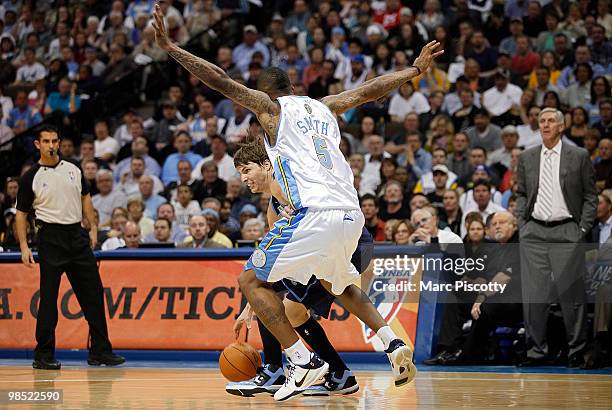 Smith of the Denver Nuggets guards Kyle Korver of the Utah Jazz as Korver tries to drive past Smith during the second half of Game One of the Western...