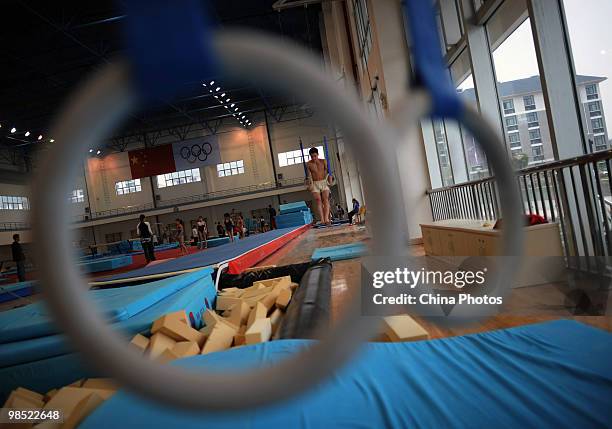 An athlete attends a training session during the 2010 Training Camp For Country's Reserve Gymnastic Athletes at the Gymnastic Hall of Hubei Olympic...