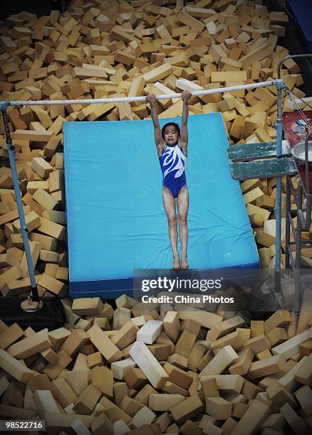 An athlete attends a training session during the 2010 Training Camp For Country's Reserve Gymnastic Athletes at the Gymnastic Hall of Hubei Olympic...