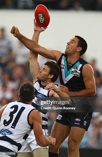 Troy Chaplin of the Power spoils a mark by Cameron Mooney of the Cats during the round four AFL match between the Geelong Cats and the Port Adelaide...