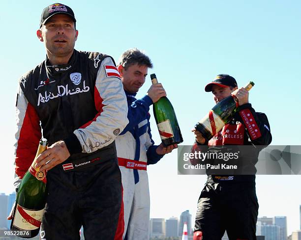 Matt Hall of Australia celebrates his 2nd, Hannes Arch of Austria his 1st and Paul Bonhomme of Great Britain his 3rd place on the podium after the...