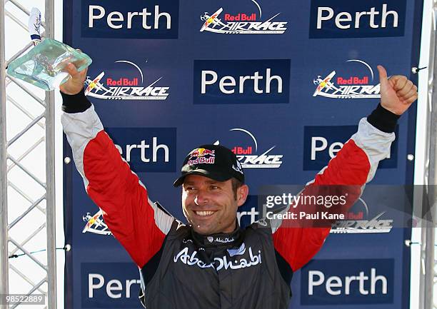 Hannes Arch of Austria celebrates winning the Red Bull Air Race Day on April 18, 2010 in Perth, Australia. Matt Hall of Australia came 2nd and Paul...