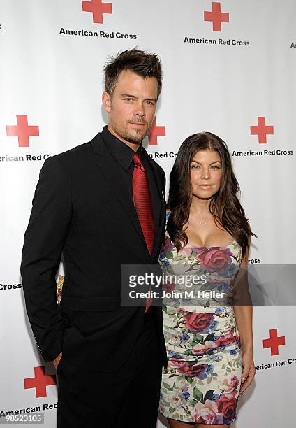 Actor Josh Duhamel and singer/actress Fergie attend the Annual Red Cross of Santa Monica's Annual "Red Tie Affair" at the Fairmont Miramar Hotel on...