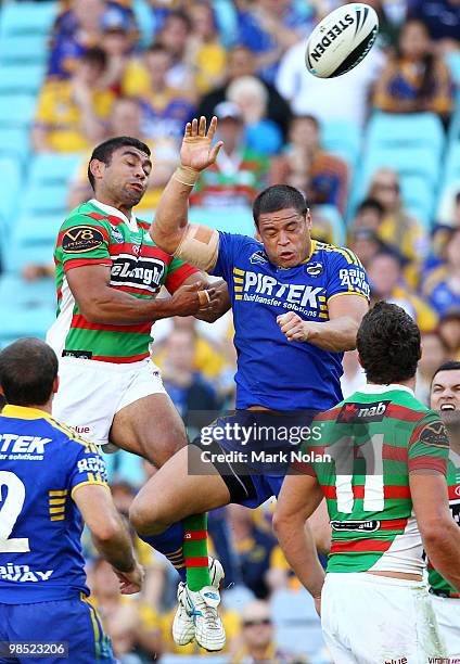 Nathan Merritt of the Rabbitohs and Timana Tahu of the Eels contest a high ball during the round six NRL match between the Parramatta Eels and the...