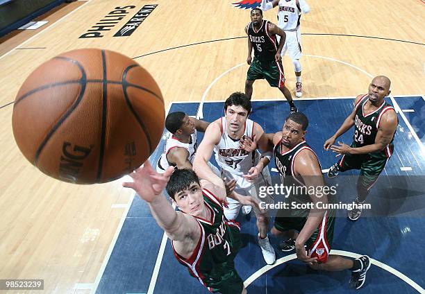 Ersan Ilyasova of the Milwaukee Bucks goes up for a rebound against the Atlanta Hawks in Game One of the Eastern Conference Quarterfinals during the...