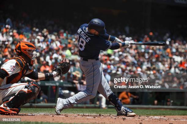 Austin Hedges of the San Diego Padres at bat against the San Francisco Giants during the second inning at AT&T Park on June 24, 2018 in San...