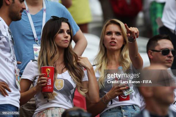Matthias Ginter of Germany's wife, Christina Ginter, and Marco Reus of Germany's girlfriend Scarlett Gartmann look on during the 2018 FIFA World Cup...