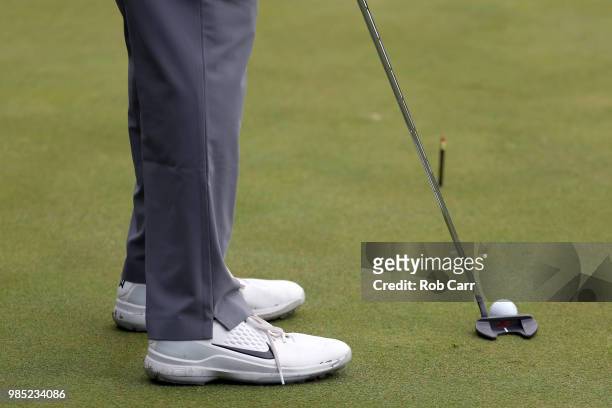 Detailed view of Tiger Woods putting while playing in the Pro-Am prior to the Quicken Loans National at TPC Potomac on June 27, 2018 in Potomac,...