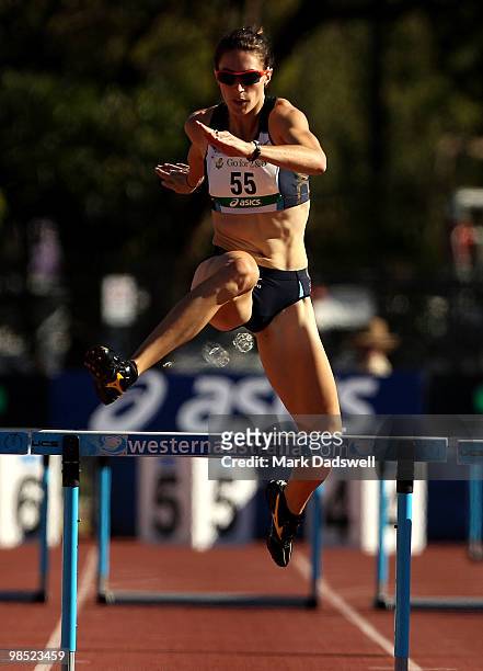 Lauren Boden of the ACTAS on her way to winning the Womens 400 Metre Hurdles Open during day three of the Australian Athletics Championships at...