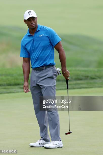 Tiger Woods putts on the fourth green in the Pro-Am prior to the Quicken Loans National at TPC Potomac on June 27, 2018 in Potomac, Maryland.